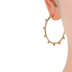 Gold plated hoops w/gold balls along the rim; nwot